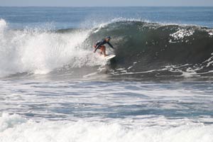 Surfing a nice left hander